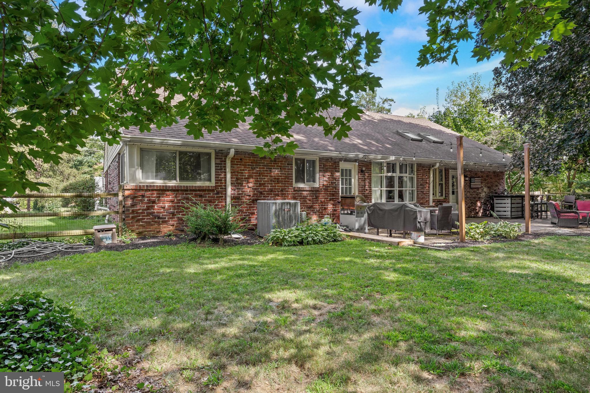 12 Greenvale Road Moorestown, NJ 08057 - Photo 29 of 49 a view of a house with a yard and sitting area