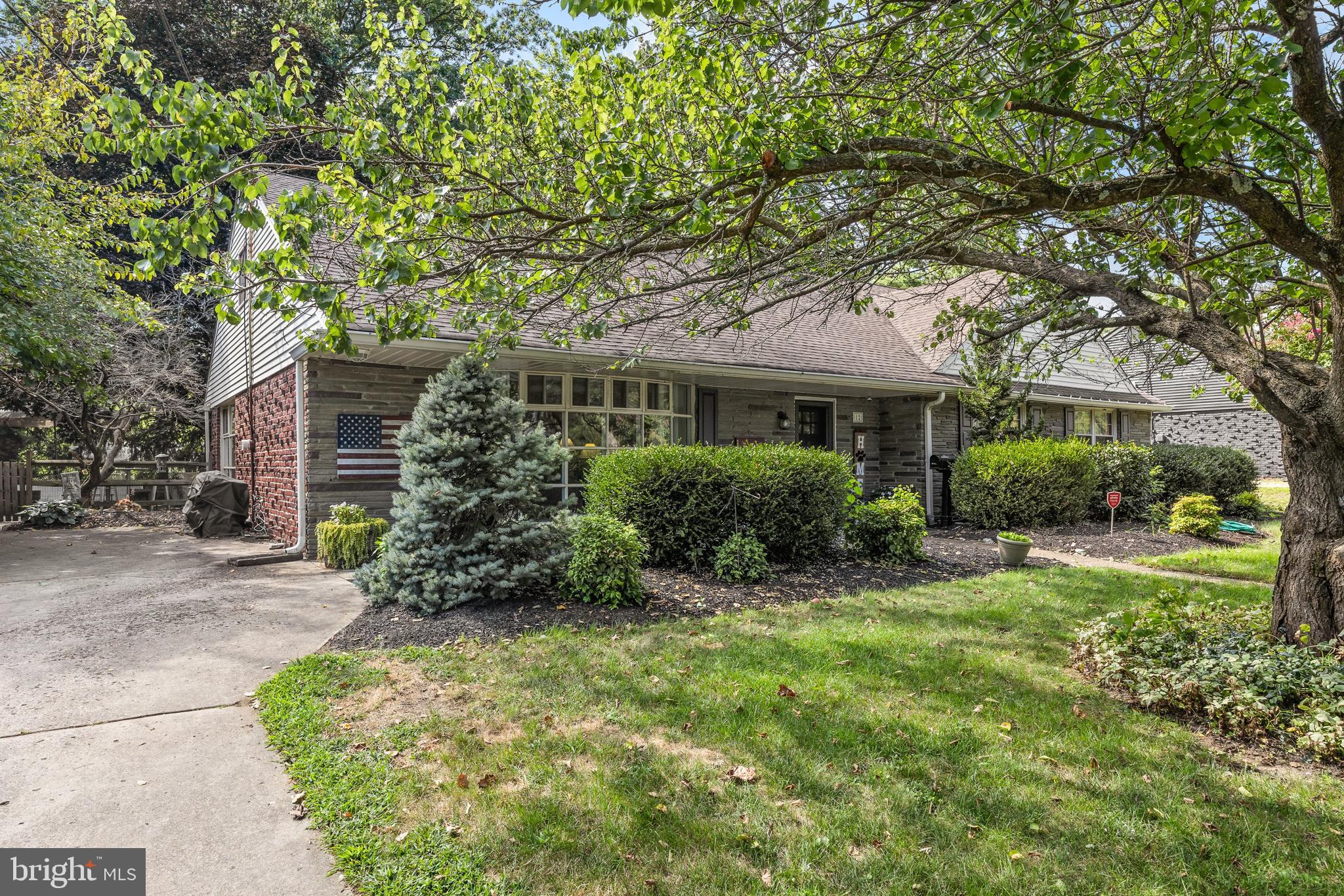 12 Greenvale Road Moorestown, NJ 08057 - Photo 3 of 49 a front view of a house with a yard