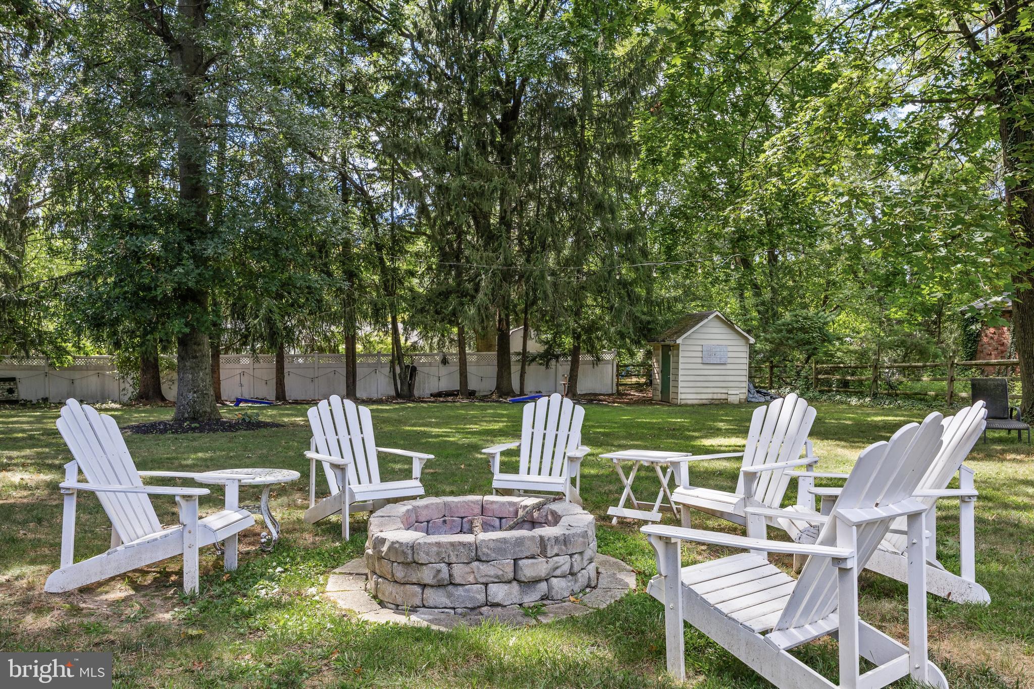 12 Greenvale Road Moorestown, NJ 08057 - Photo 35 of 49 a view of backyard with seating and green space