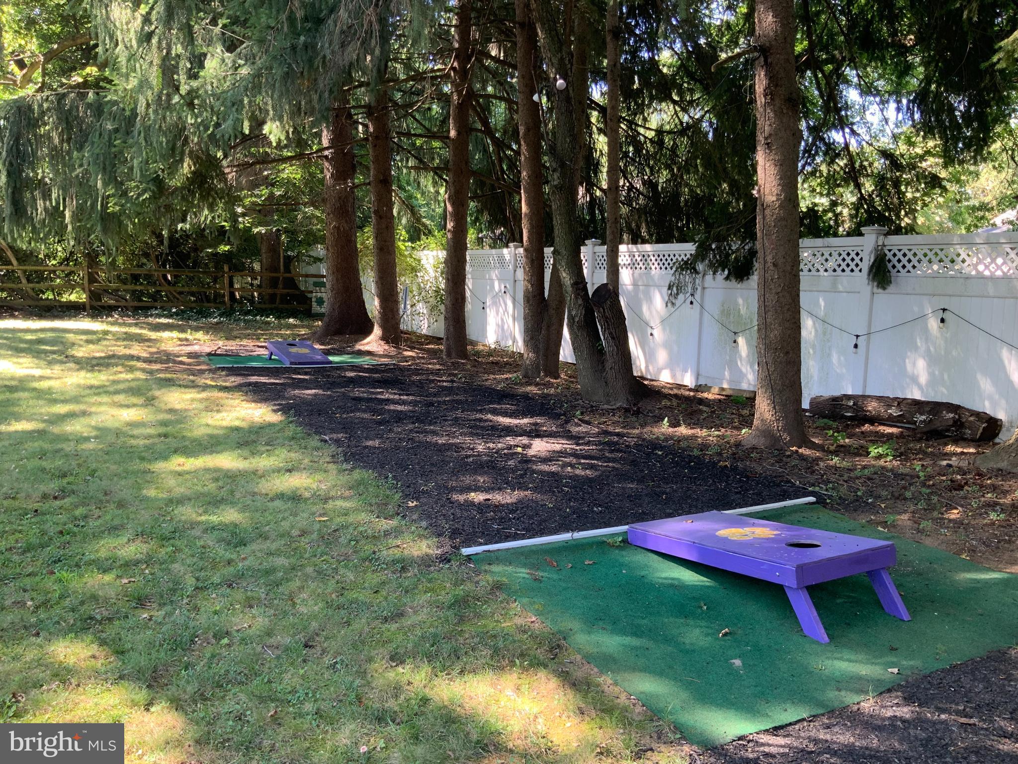 12 Greenvale Road Moorestown, NJ 08057 - Photo 38 of 49 a backyard of a house with table and chairs