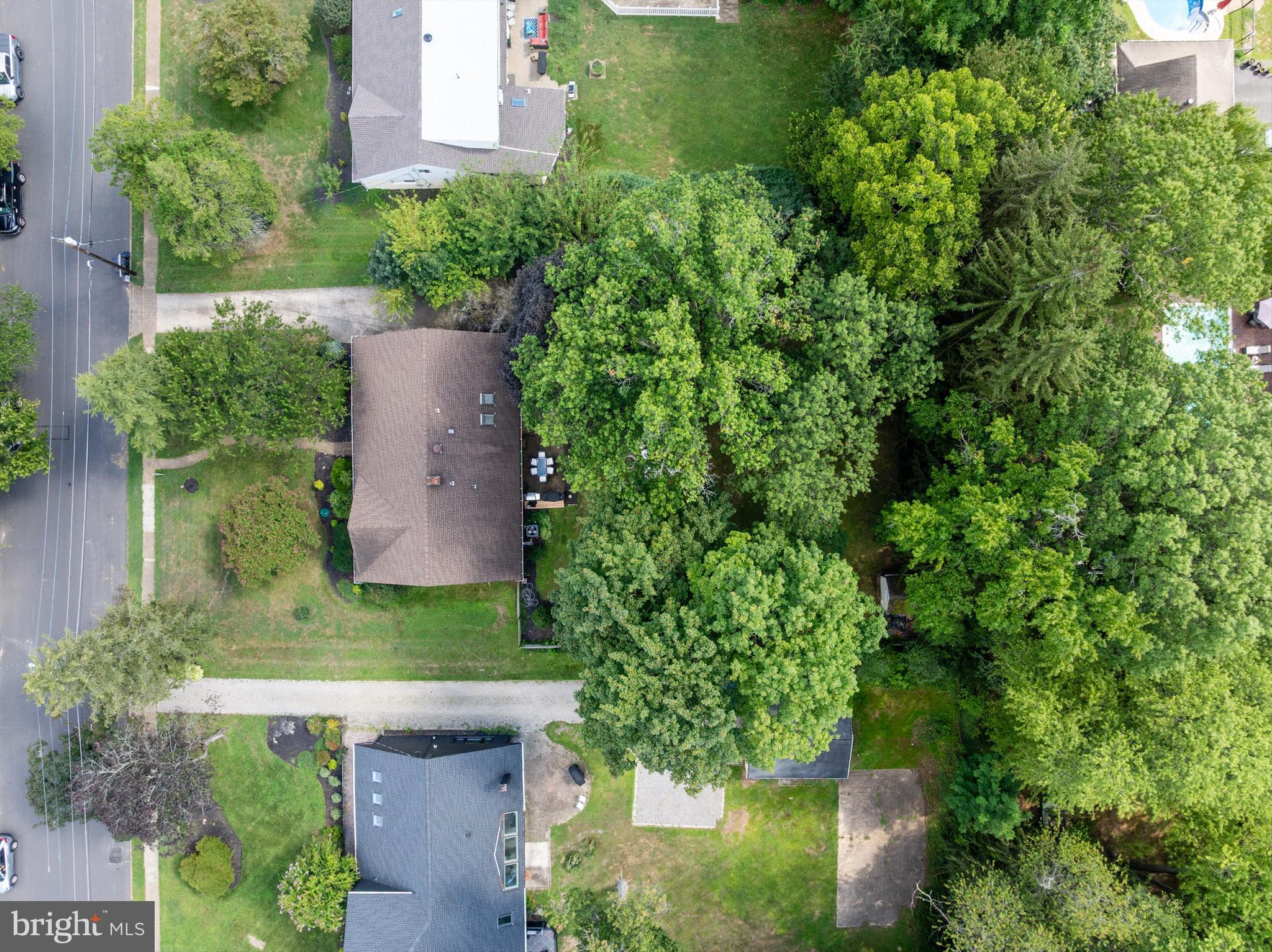 12 Greenvale Road Moorestown, NJ 08057 - Photo 45 of 49 an aerial view of a house with a yard and plants