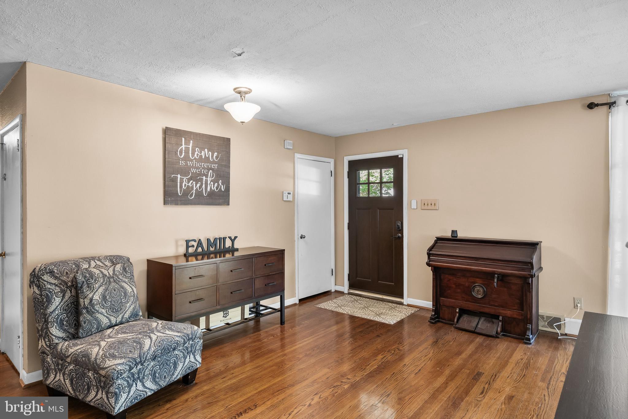 12 Greenvale Road Moorestown, NJ 08057 - Photo 6 of 49 a living room with furniture and a fireplace