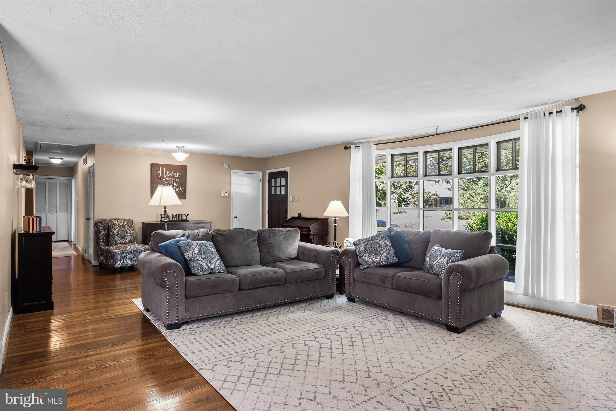 12 Greenvale Road Moorestown, NJ 08057 - Photo 8 of 49 a living room with furniture and a window