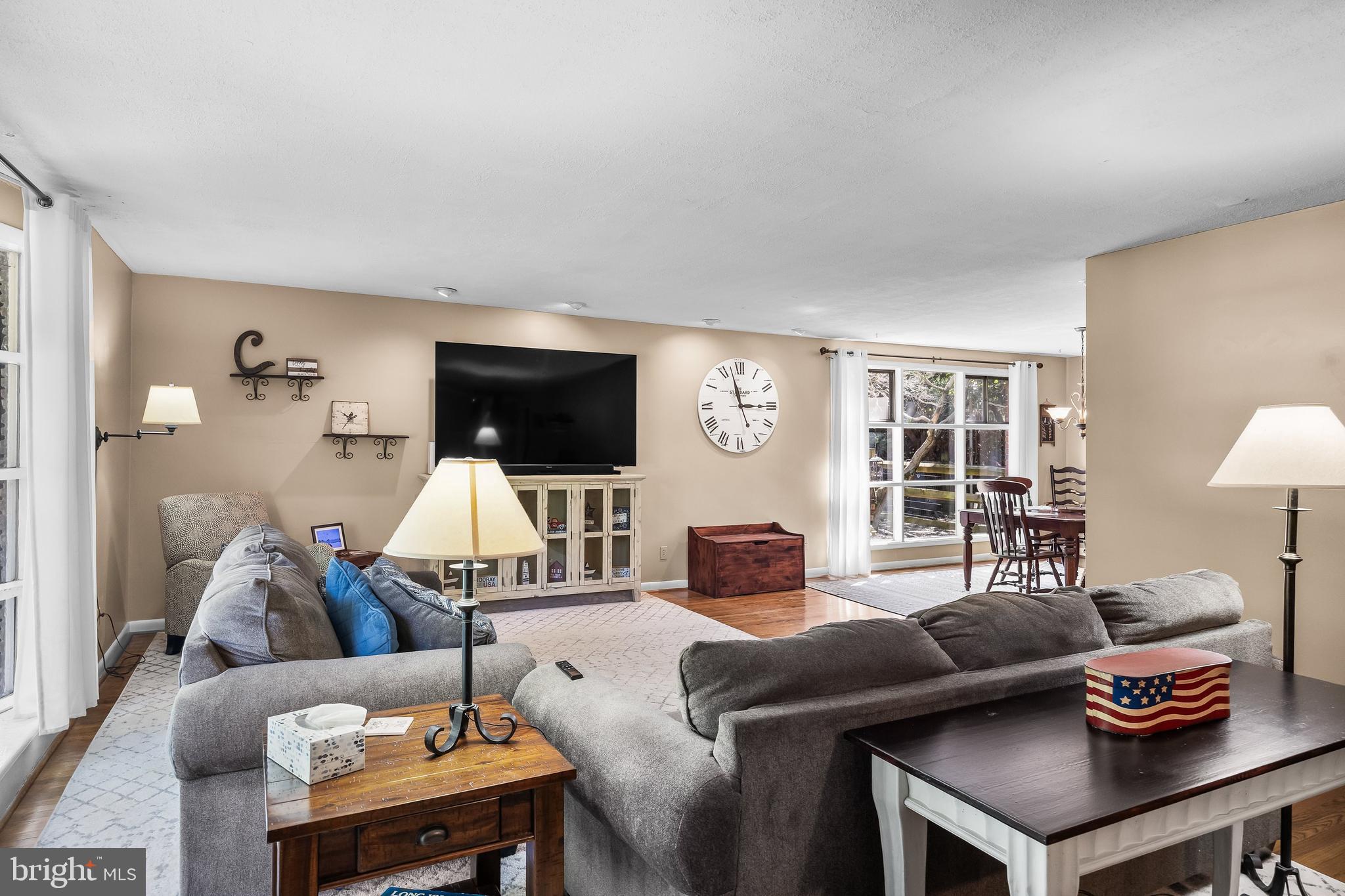 12 Greenvale Road Moorestown, NJ 08057 - Photo 9 of 49 a living room with furniture and a flat screen tv