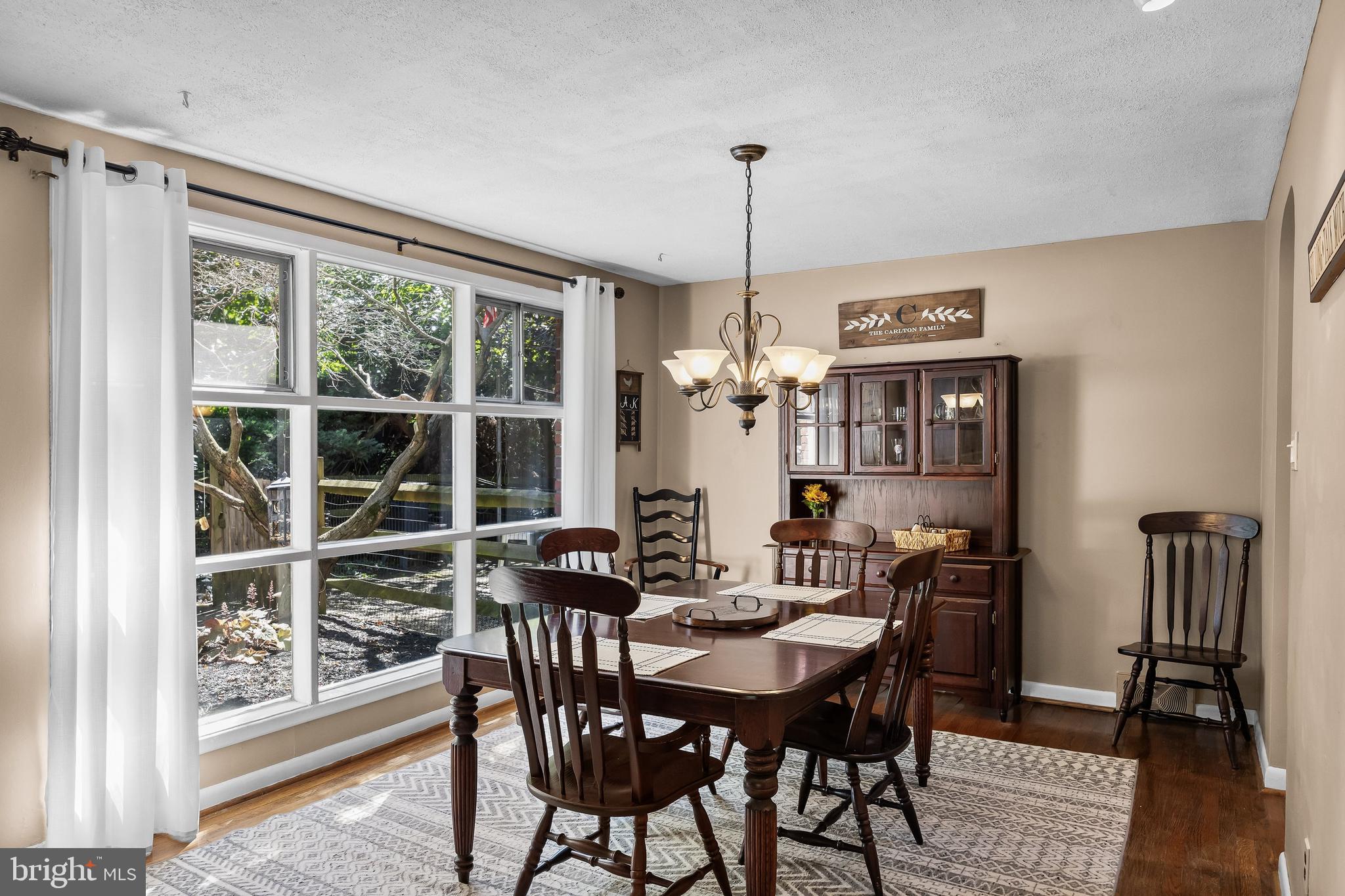 12 Greenvale Road Moorestown, NJ 08057 - Photo 10 of 49 a view of a dining room with furniture window and wooden floor