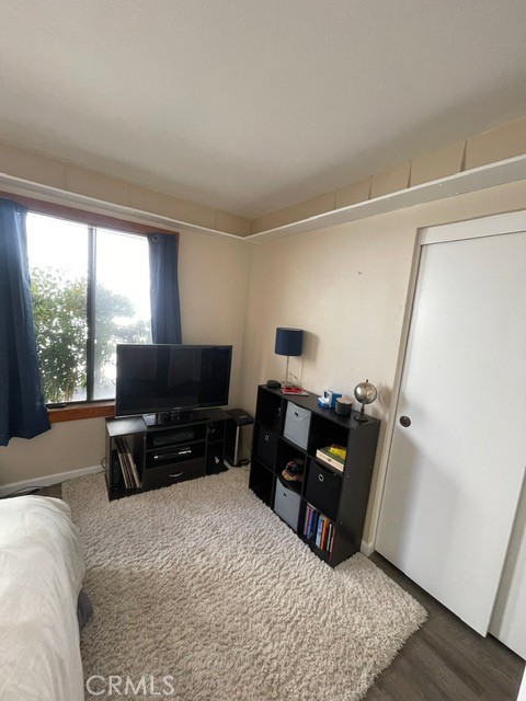 6435 Melray Street Moorpark, CA 93021 - Photo 11 of 41 a living room with furniture and a flat screen tv