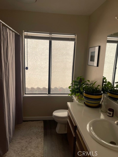 6435 Melray Street Moorpark, CA 93021 - Photo 15 of 41 a bathroom with a sink toilet and a mirror