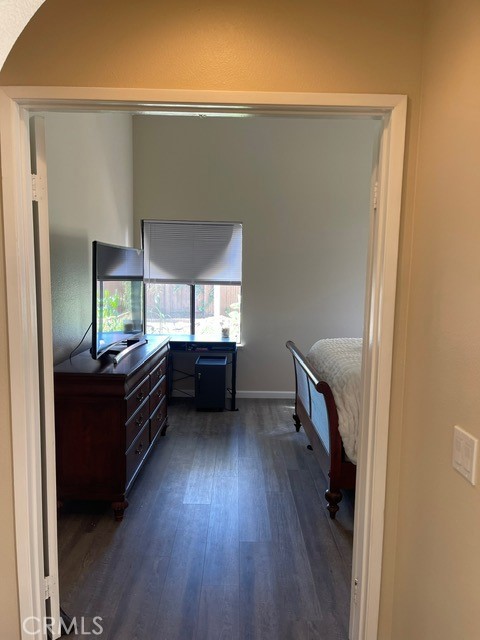 6435 Melray Street Moorpark, CA 93021 - Photo 24 of 41 a room with wooden floor and furniture