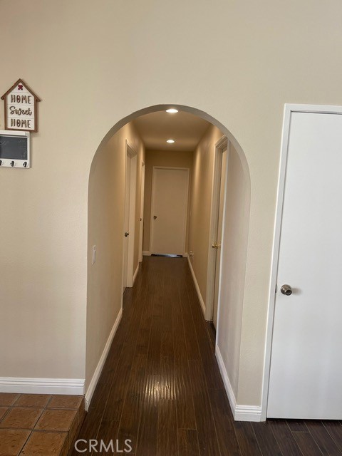 6435 Melray Street Moorpark, CA 93021 - Photo 27 of 41 a view of a hallway with wooden floor