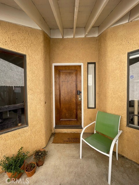 6435 Melray Street Moorpark, CA 93021 - Photo 3 of 41 a room with furniture and a flat screen tv