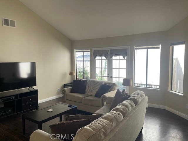 6435 Melray Street Moorpark, CA 93021 - Photo 36 of 41 a living room with furniture and a flat screen tv