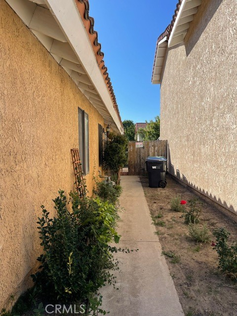 6435 Melray Street Moorpark, CA 93021 - Photo 4 of 41 a front view of a house with a yard