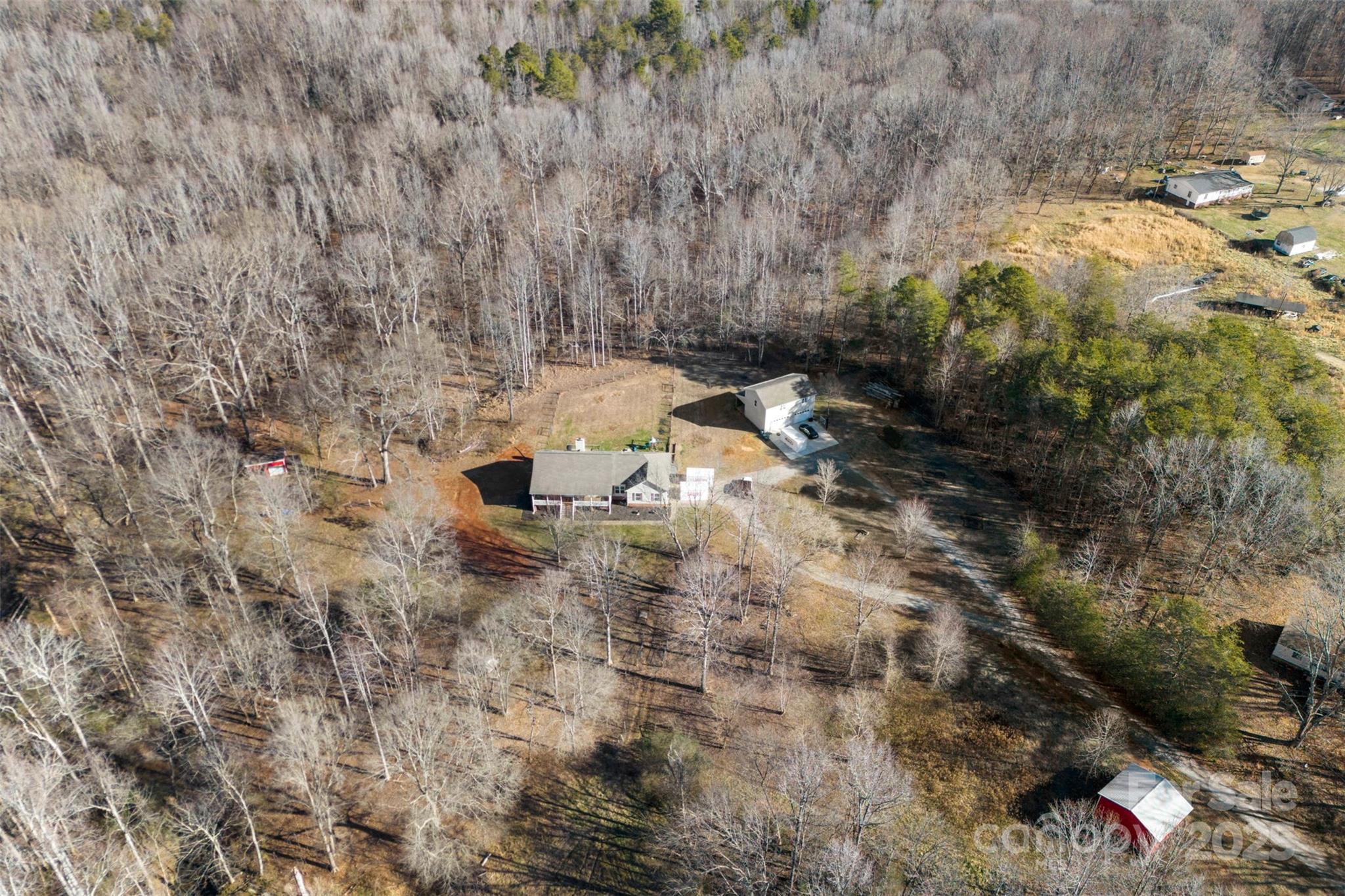 1298 Hines Road Clover, SC 29710 - Photo 8 of 40 a backyard of a house with lots of green space