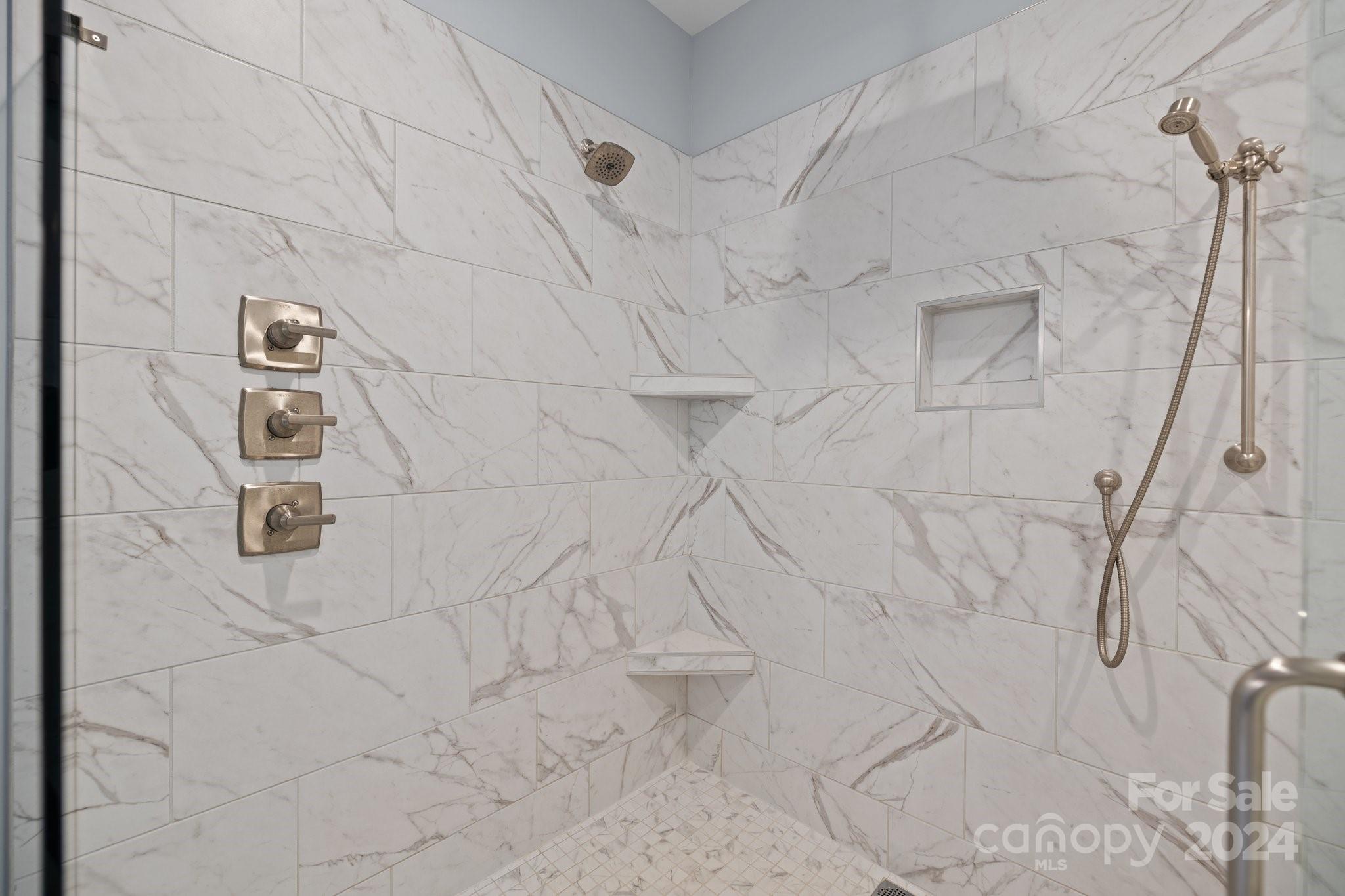 3067 Reservation Road Rock Hill, SC 29730 - Photo 27 of 45 a white bath tub sitting in a bathroom