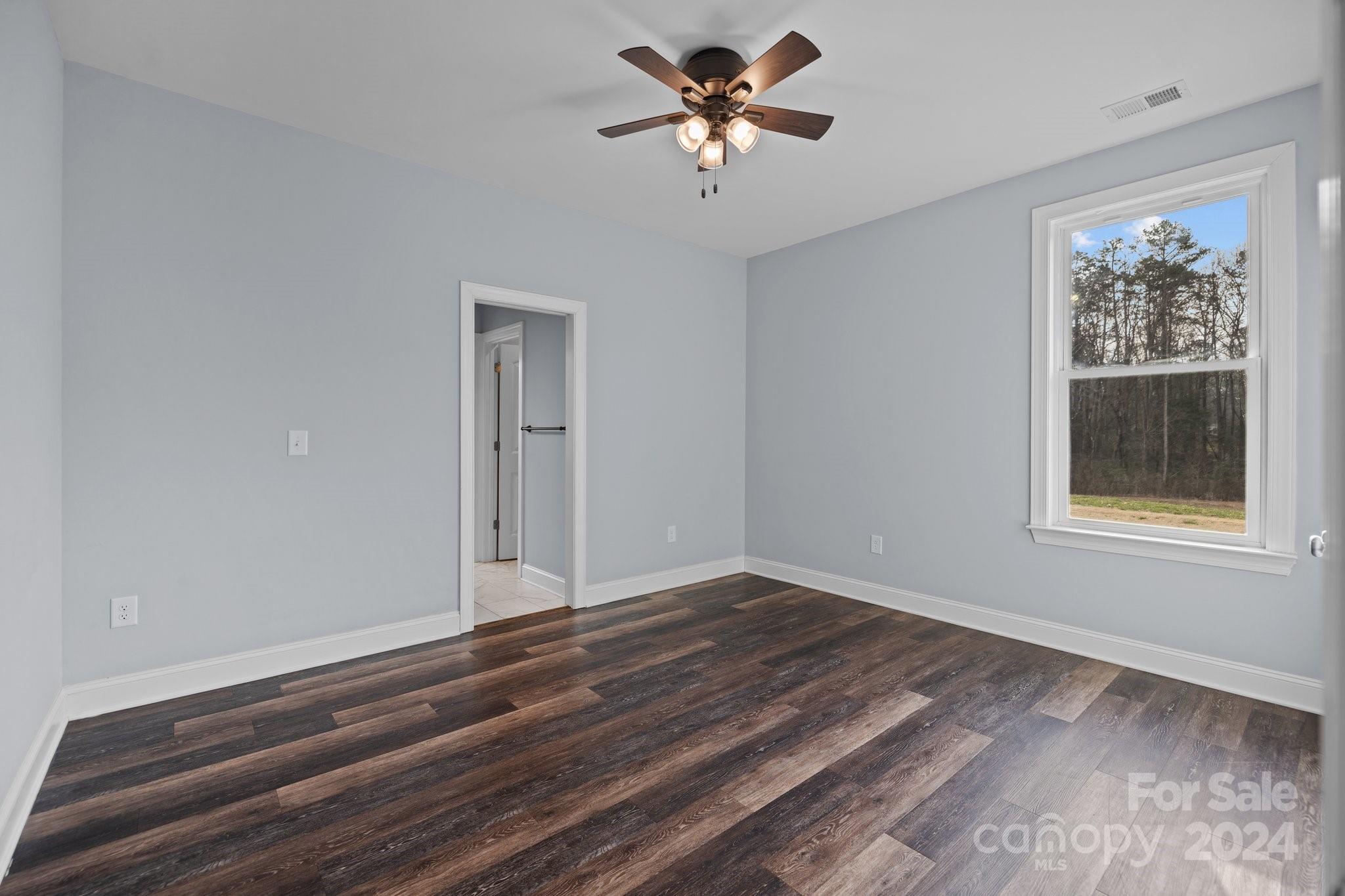 3067 Reservation Road Rock Hill, SC 29730 - Photo 34 of 45 a view of empty room with wooden floor and fan