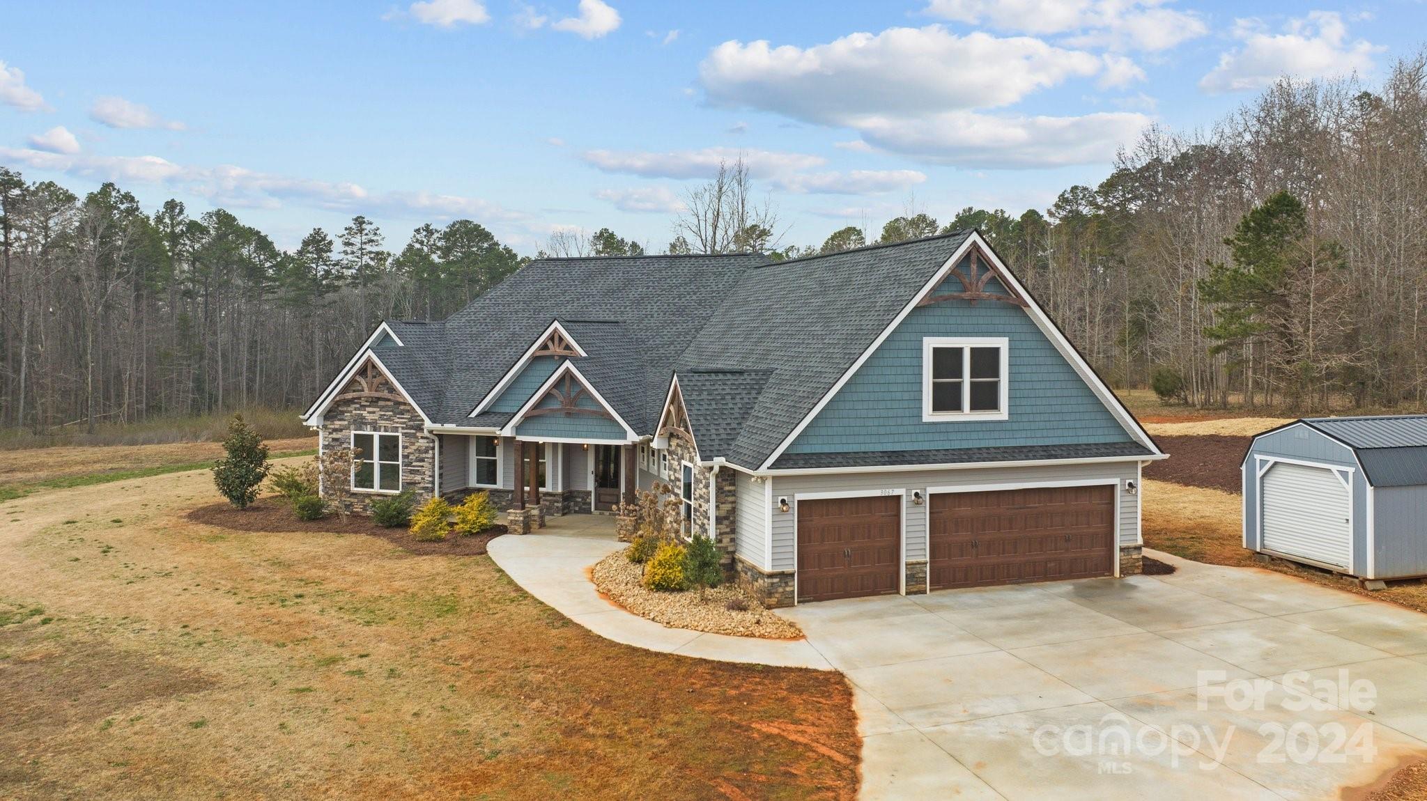 3067 Reservation Road Rock Hill, SC 29730 - Photo 4 of 45 a front view of a house with a yard and garage