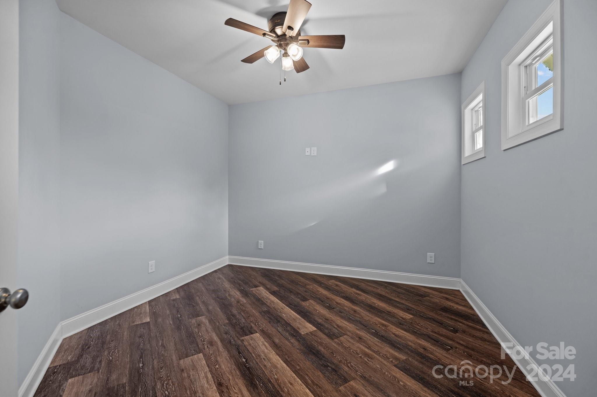 3067 Reservation Road Rock Hill, SC 29730 - Photo 41 of 45 a view of an empty room with a window and wooden floor