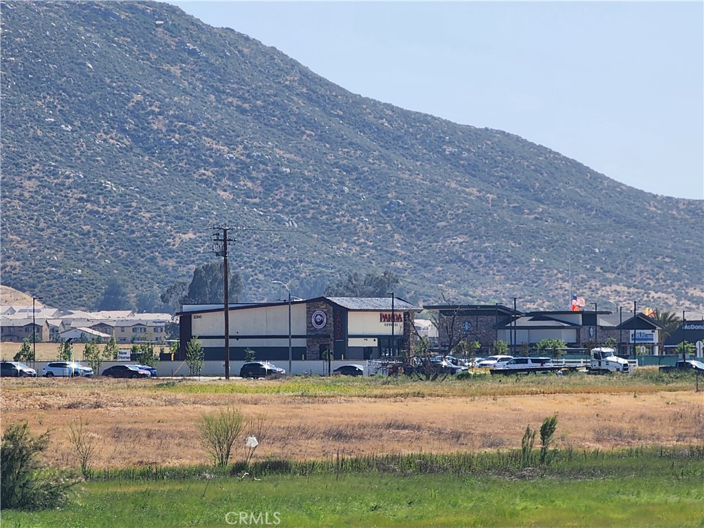 0 Olive Winchester, CA 92596 - Photo 31 of 43 a view of a swimming pool with an outdoor space and seating area
