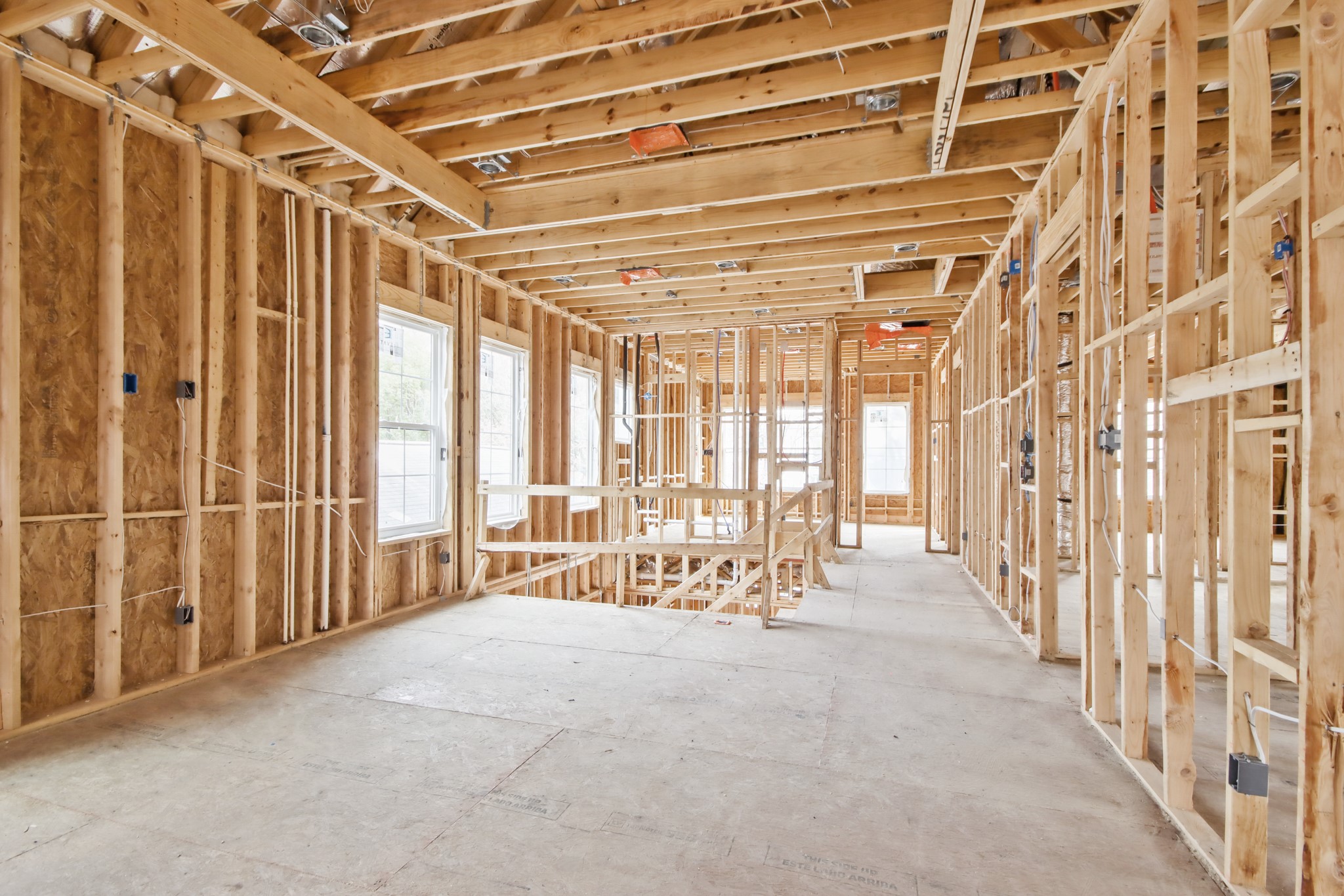 715 Merrill Street Houston, TX 77009 - Photo 27 of 50 a big room with wooden shelves and windows