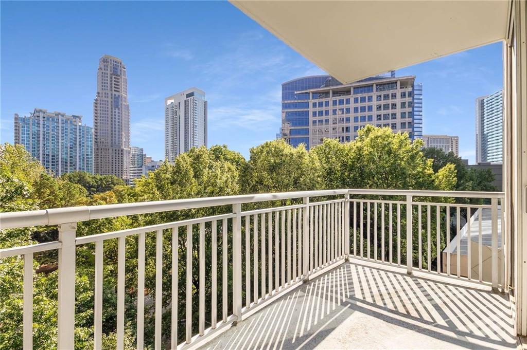 3338 Peachtree Road Northeast, Unit 407 Atlanta, GA 30326 - Photo 17 of 39 a view of a balcony with city view