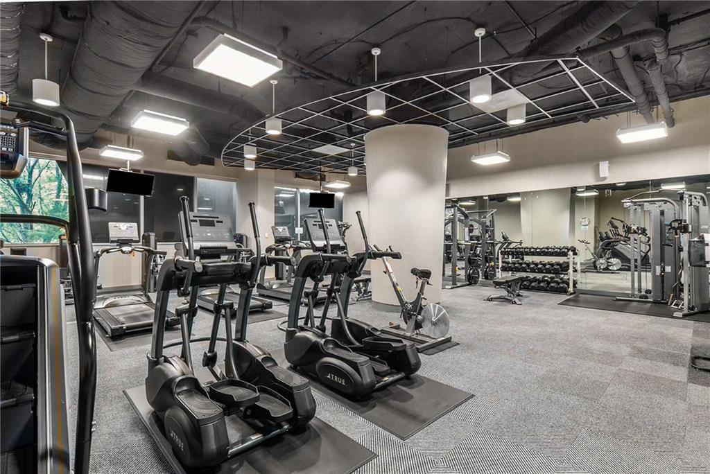 3338 Peachtree Road Northeast, Unit 407 Atlanta, GA 30326 - Photo 27 of 39 a view of a room with gym equipment
