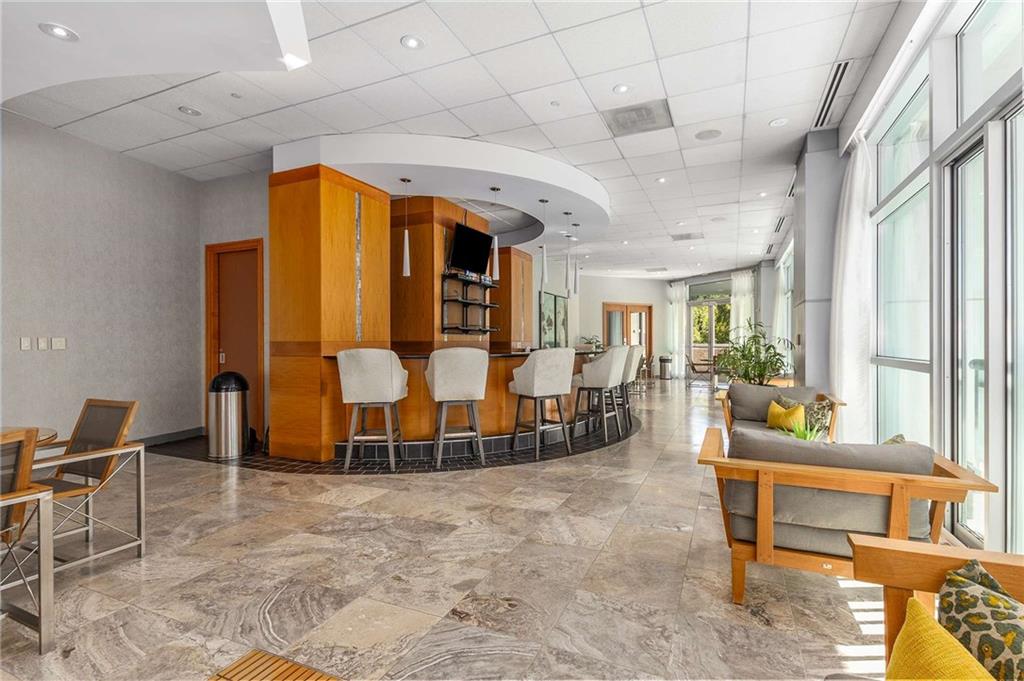 3338 Peachtree Road Northeast, Unit 407 Atlanta, GA 30326 - Photo 31 of 39 a living room with furniture