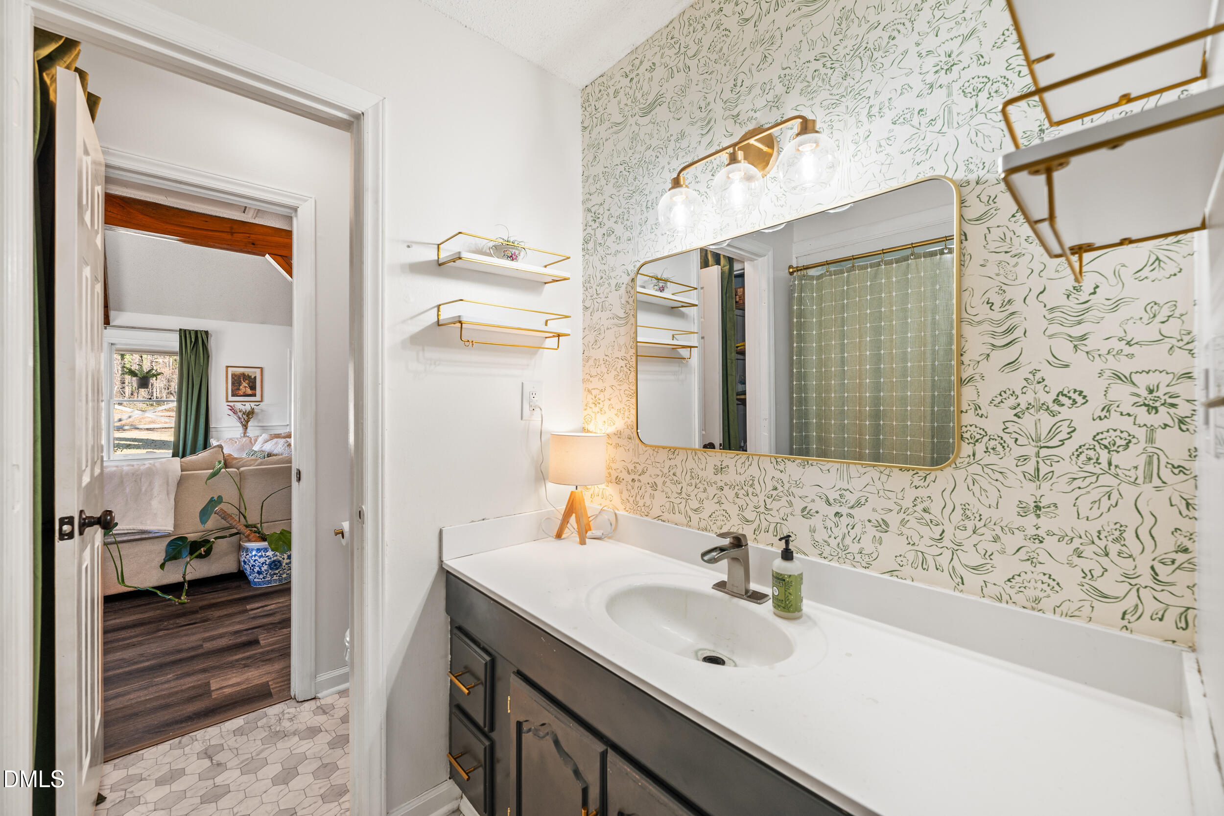 2618 Brame Road Greensboro, NC 27405 - Photo 21 of 64 a bathroom with a sink and a mirror