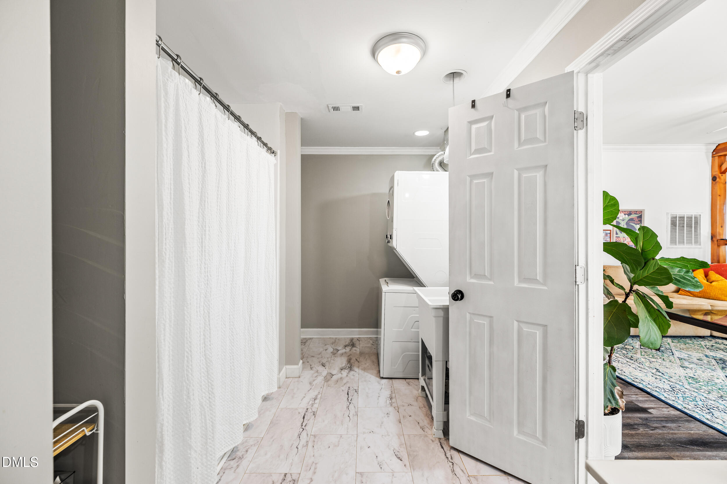 2618 Brame Road Greensboro, NC 27405 - Photo 29 of 64 a view of a hallway to a livingroom with furniture and stairs
