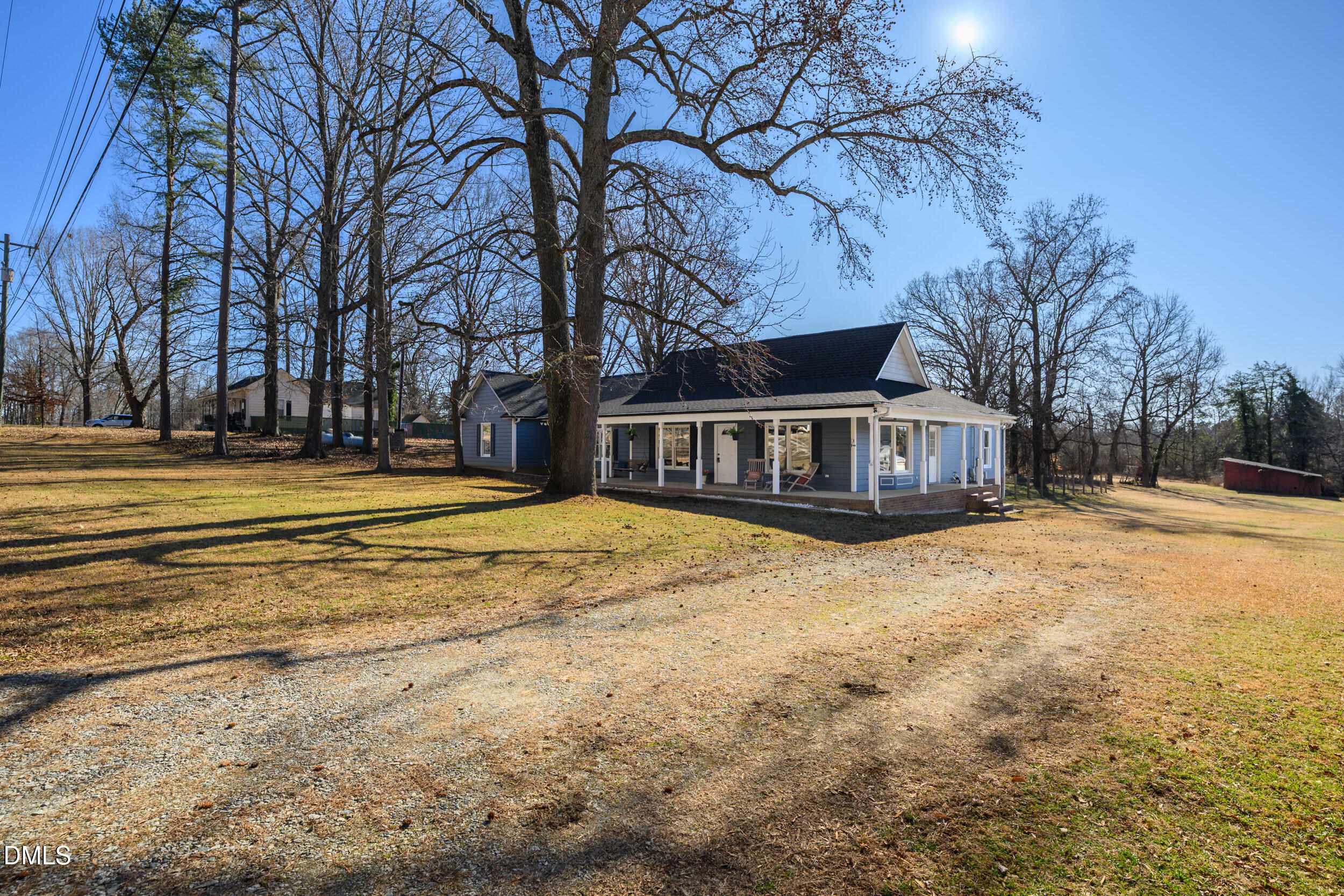 2618 Brame Road Greensboro, NC 27405 - Photo 2 of 64 a swimming pool with trees in the background