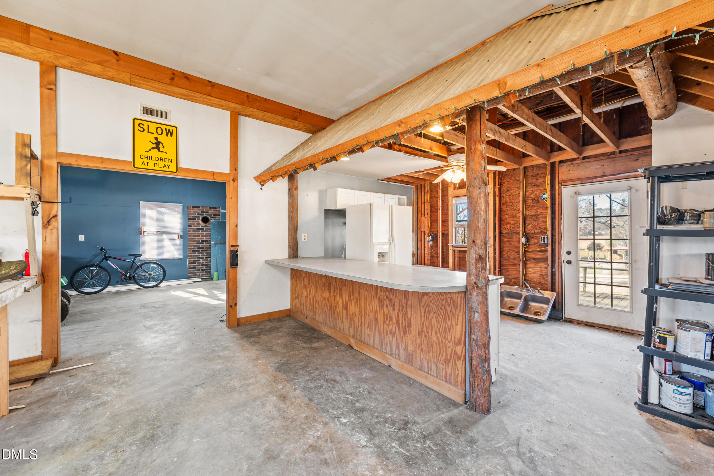 2618 Brame Road Greensboro, NC 27405 - Photo 47 of 64 a view of a porch with furniture and a wooden roof