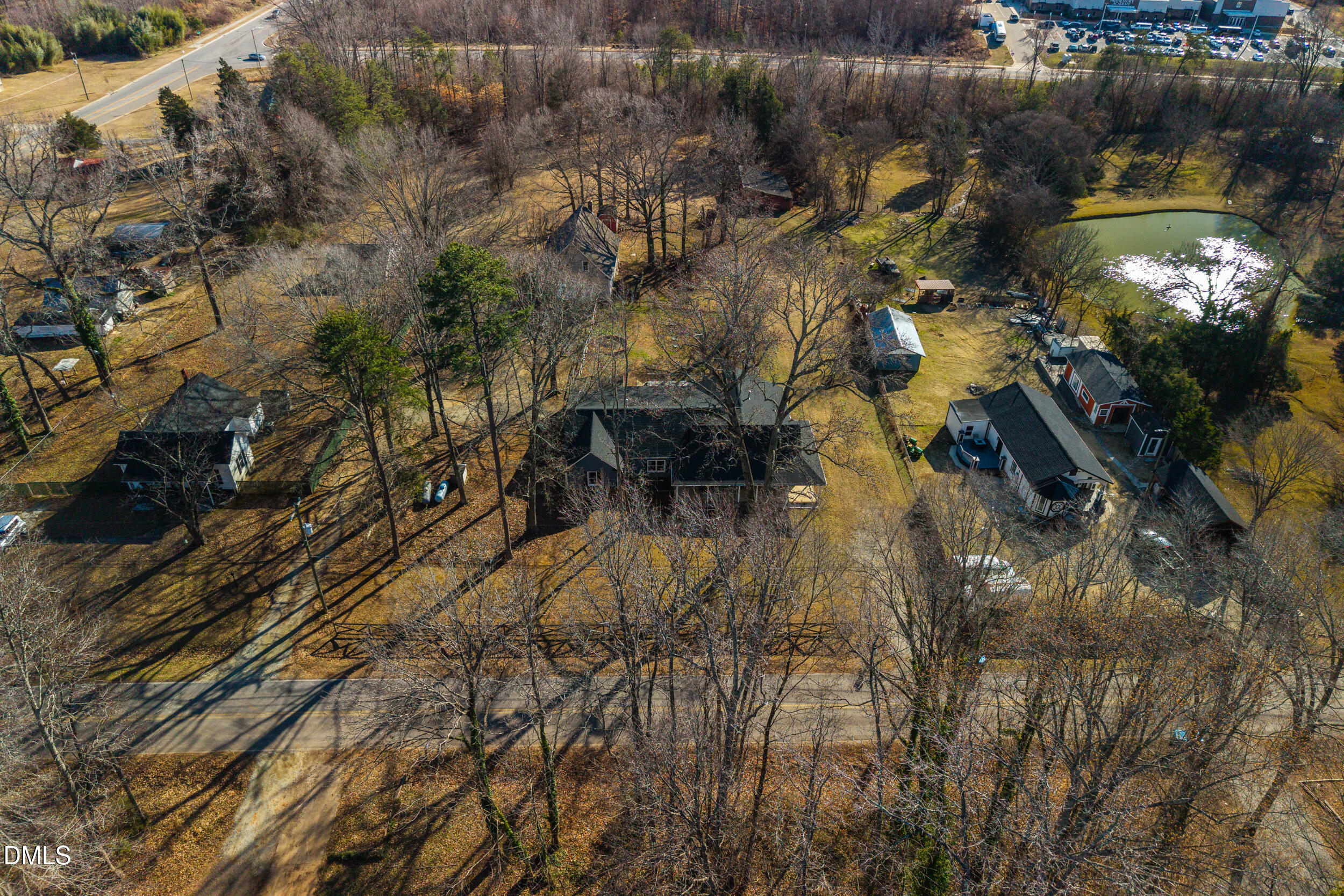 2618 Brame Road Greensboro, NC 27405 - Photo 62 of 64 a backyard of a house with a yard and outdoor seating