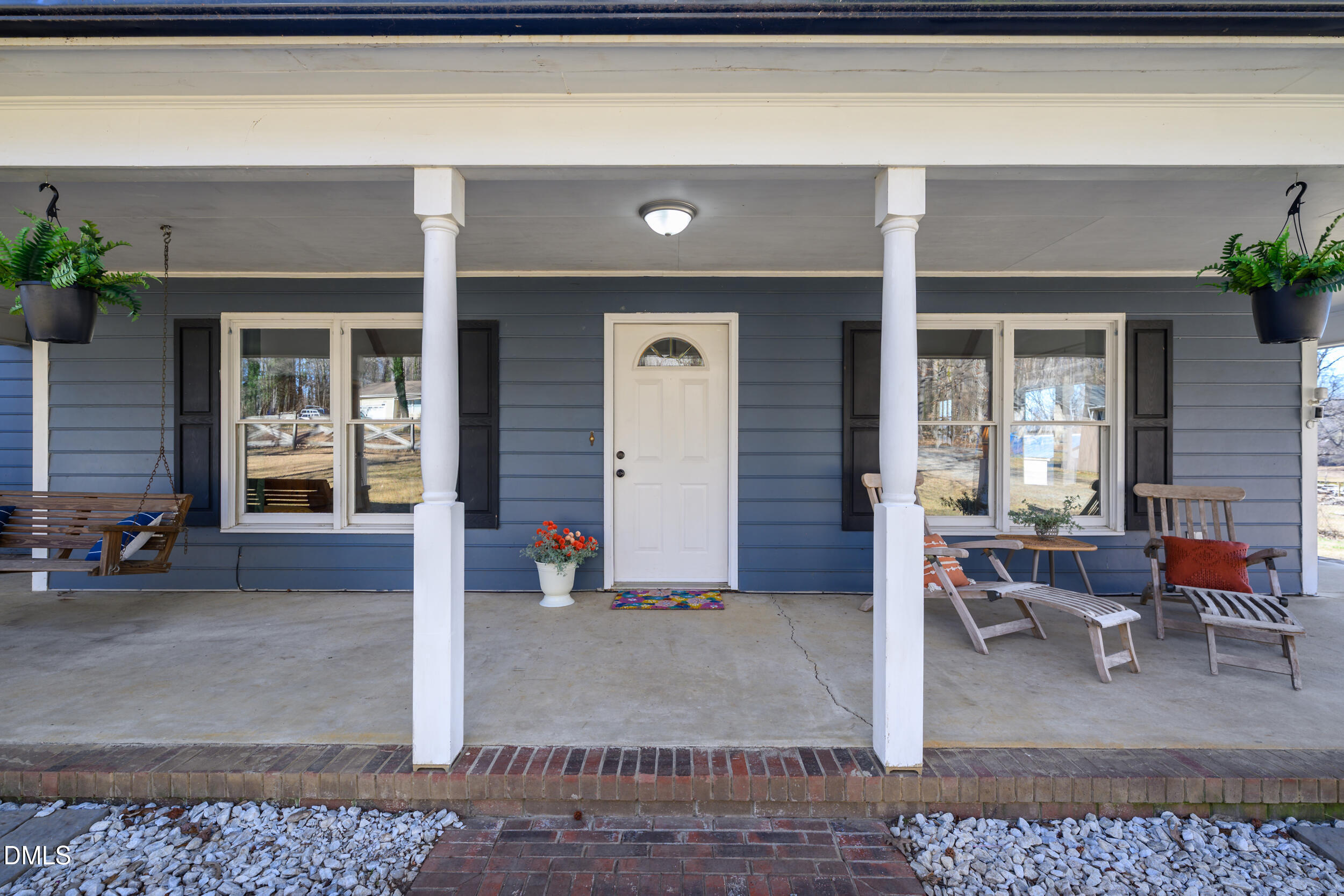 2618 Brame Road Greensboro, NC 27405 - Photo 6 of 64 a front view of a house with outdoor seating
