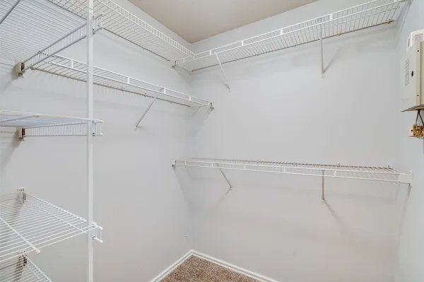 a view of a room with racks on the wall