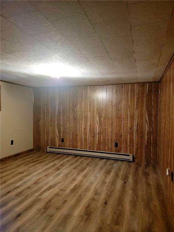 51 Sheldon Avenue Fairchance, PA 15436 - Photo 15 of 18 an empty room with wooden floor and windows