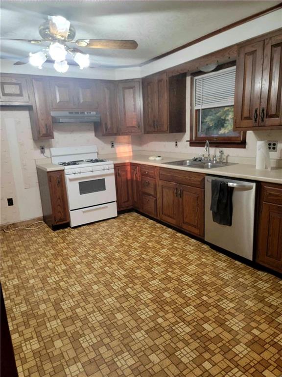 51 Sheldon Avenue Fairchance, PA 15436 - Photo 6 of 18 a kitchen with stainless steel appliances granite countertop a sink stove and cabinets