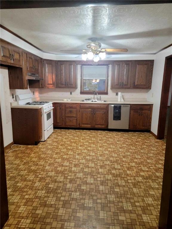 51 Sheldon Avenue Fairchance, PA 15436 - Photo 7 of 18 a large kitchen with stainless steel appliances a sink and cabinets