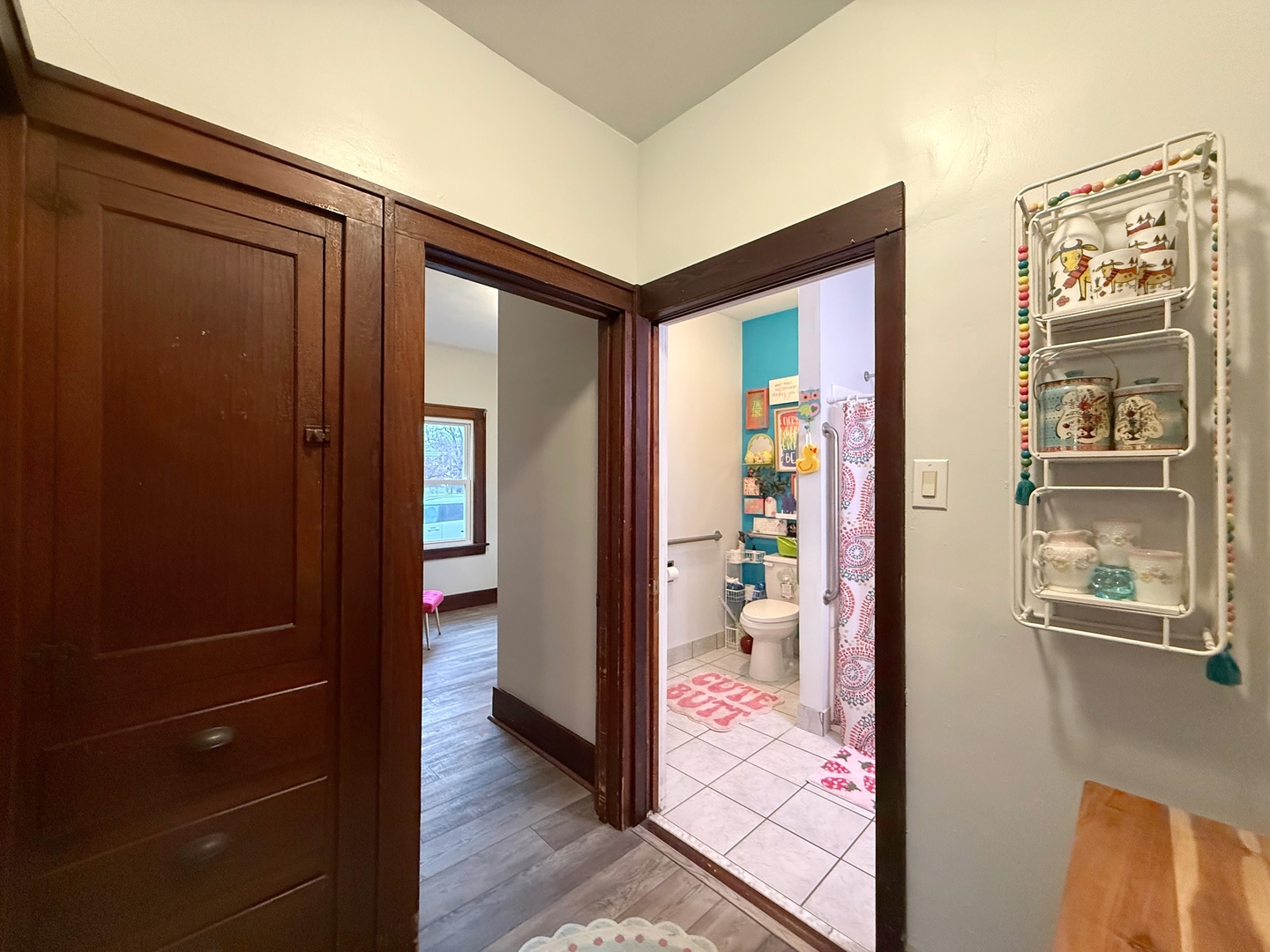 621 24th Avenue Moline, IL 61265 - Photo 20 of 31 hallway with wooden floor and a bathroom