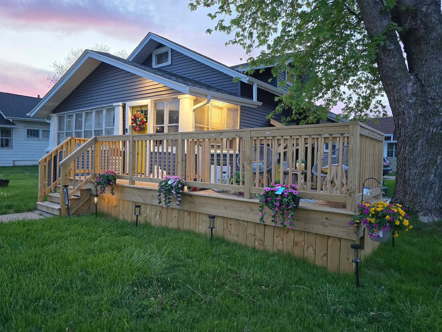 621 24th Avenue Moline, IL 61265 - Photo 31 of 31 a view of a house with backyard and a garden