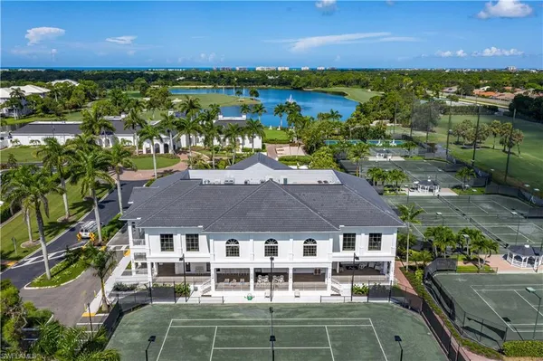 a aerial view of a house with a lake view