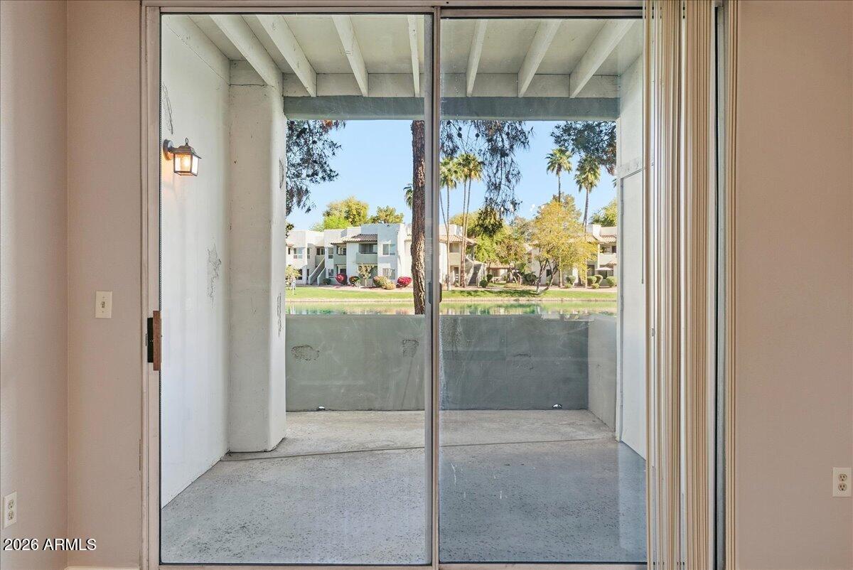1825 West Ray Road, Unit 1106 Chandler, AZ 85224 - Photo 14 of 62 a bathroom with a glass shower door