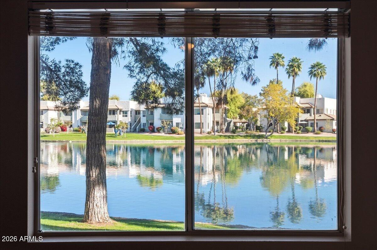 1825 West Ray Road, Unit 1106 Chandler, AZ 85224 - Photo 20 of 62 a view of swimming pool from a window