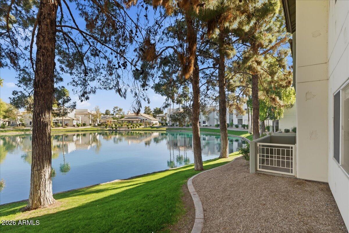 1825 West Ray Road, Unit 1106 Chandler, AZ 85224 - Photo 31 of 62 a view of lake with mountain