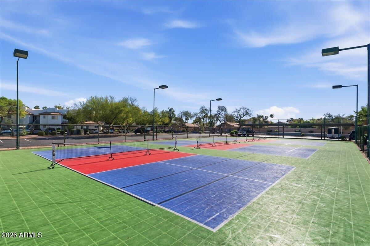 1825 West Ray Road, Unit 1106 Chandler, AZ 85224 - Photo 37 of 62 a view of an outdoor space and swimming pool