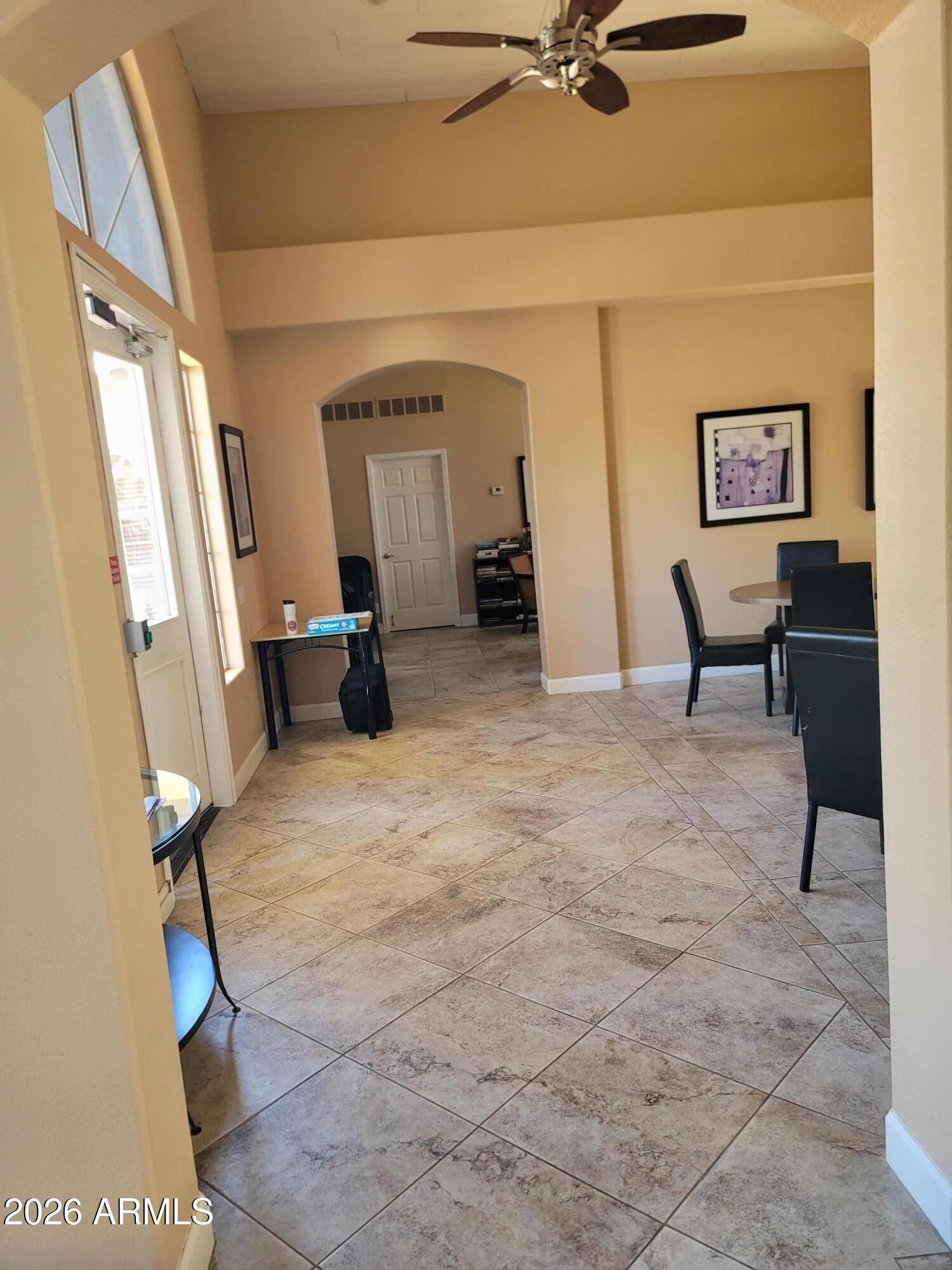 1825 West Ray Road, Unit 1106 Chandler, AZ 85224 - Photo 56 of 62 a view of a livingroom with couch and furniture