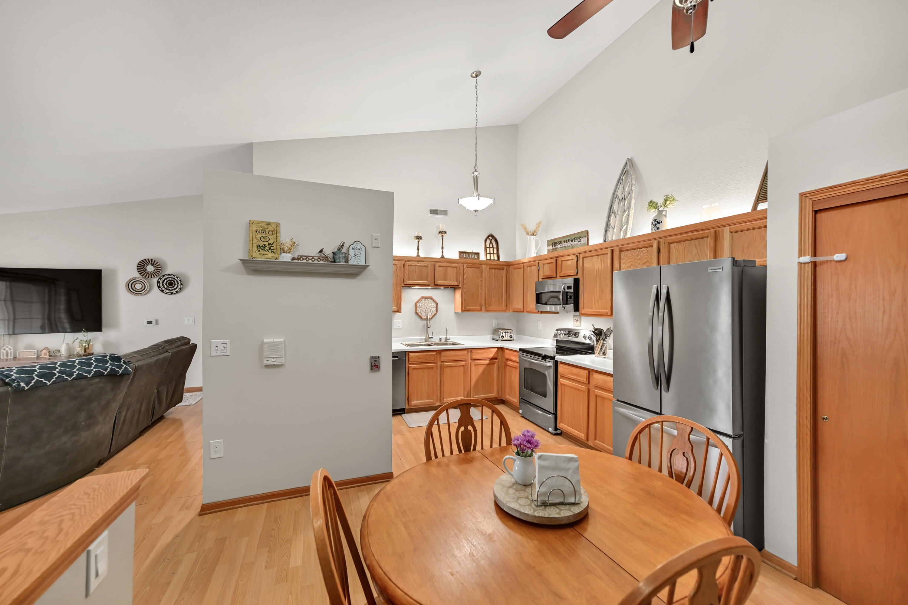 9332 West Loomis Road, Unit 6 Franklin, WI 53132 - Photo 11 of 26 Open Concept Kitchen and Great Room