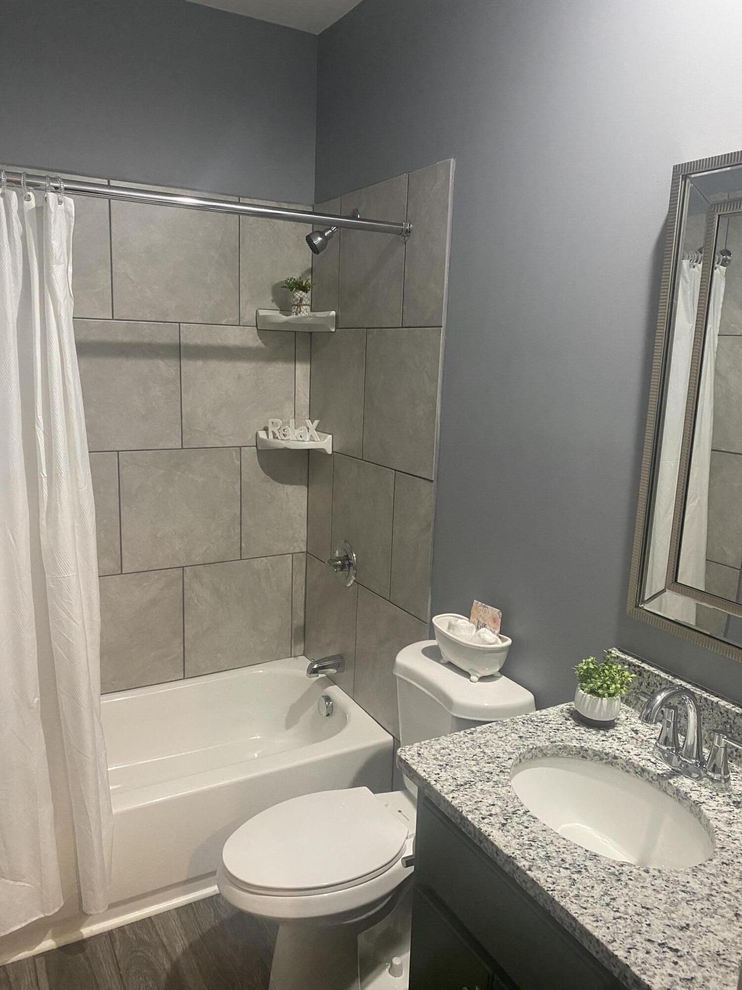 1116 Union Church Road Thomson, GA 30824 - Photo 17 of 26 Granite counter top tile wall tub/shower combination