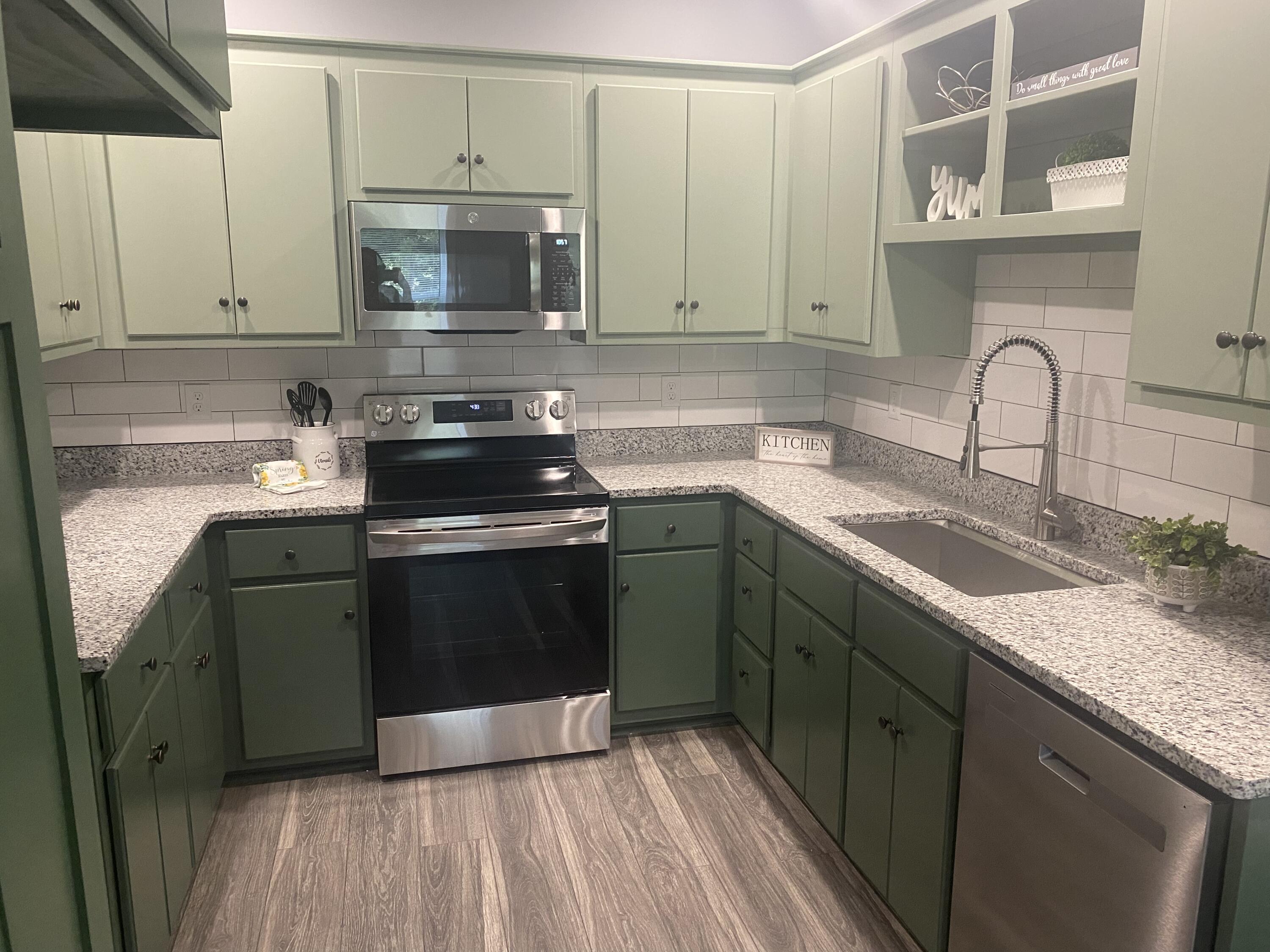 1116 Union Church Road Thomson, GA 30824 - Photo 7 of 26 Stainless steel microwave, stove, and dishwasher