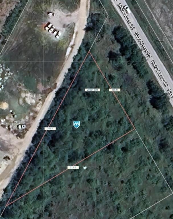 18509 Blake Manor Road Manor, TX 78653 - Photo 16 of 17 a picture of street view