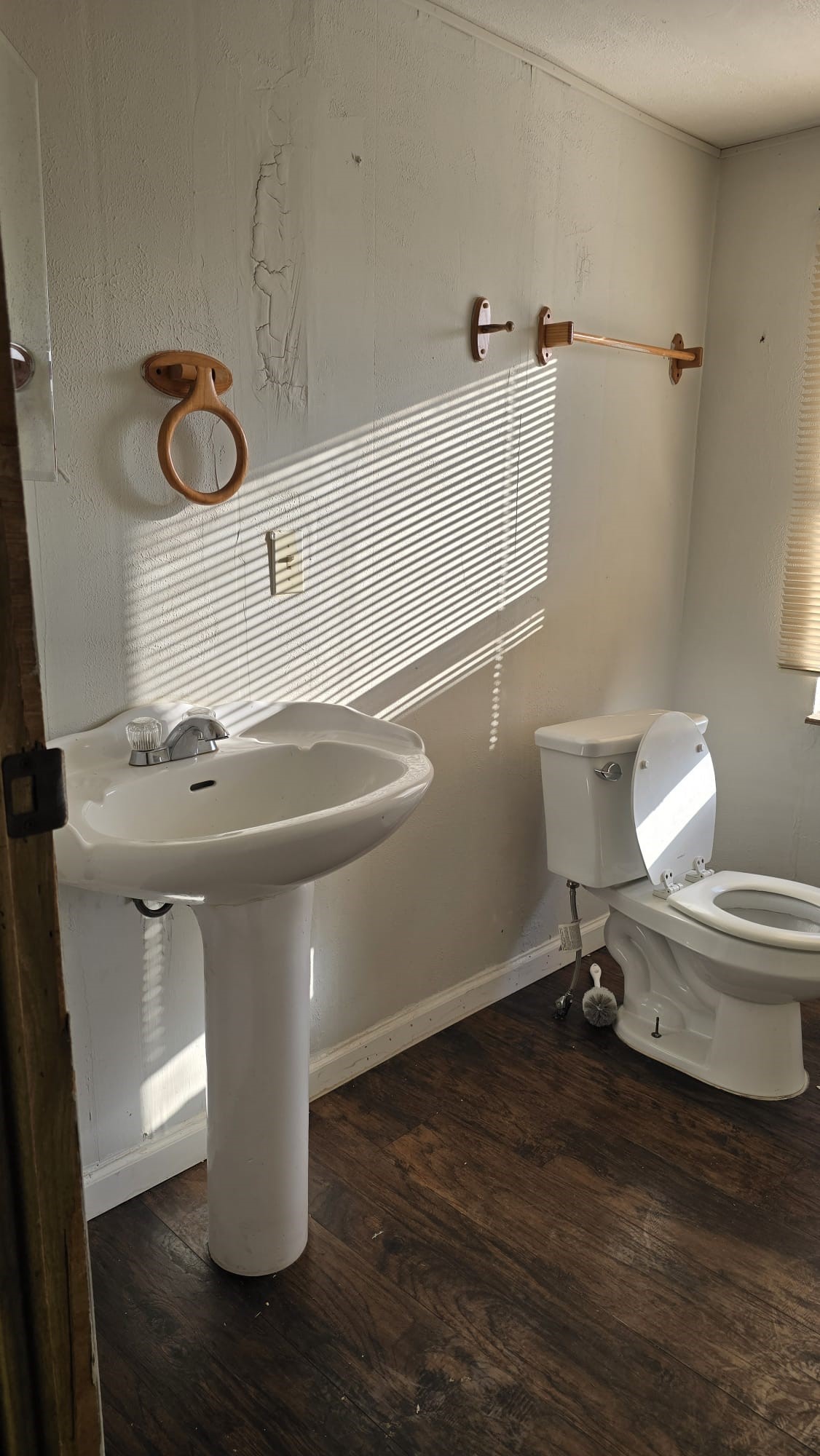 18509 Blake Manor Road Manor, TX 78653 - Photo 7 of 17 a bathroom with a sink toilet and mirror