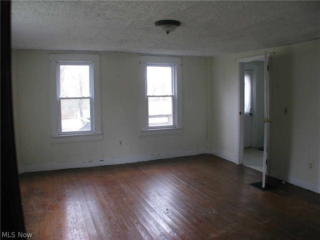 12449 Old State Road Huntsburg, OH 44046 - Photo 12 of 17 Possible first floor master bedroom or family room looking towards front of home